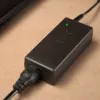 Klēpjdatora lādētājs Akyga AK-ND-85, iekštelpu maiņstrāvas adapteris, ieeja 100–250 V, izeja 12 V 5 A, 1,2 m kabelis, melns