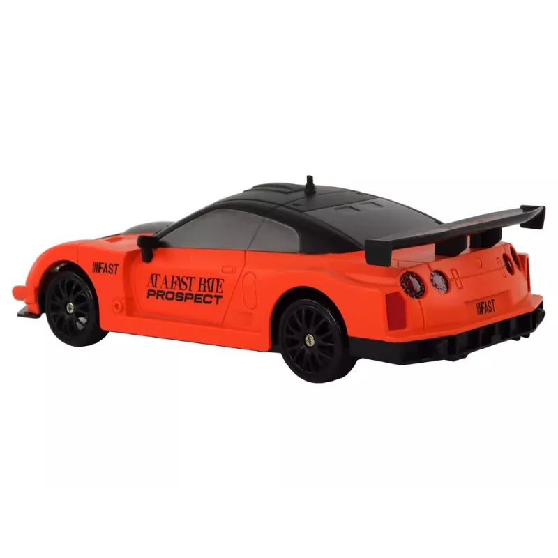 LEAN TOYS Ar vadību vadāma sporta automašīna R/C 1:24 Oranža ar maināmiem riteņiem