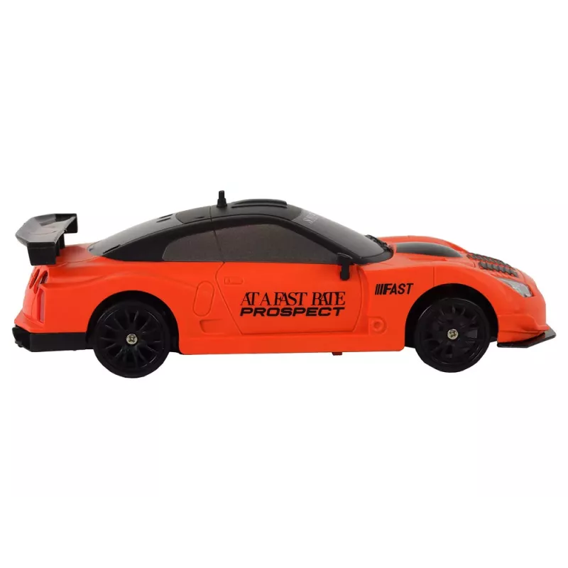 LEAN TOYS Ar vadību vadāma sporta automašīna R/C 1:24 Oranža ar maināmiem riteņiem