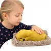 LEAN TOYS Guļošs labradora kucēns uz spilvena figūriņa ar kažoku un caurspīdīgu maisiņu