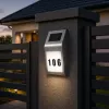 LEAN Saules LED sienas lampa ar mājas numura apgaismojumu, nerūsējošais tērauds