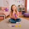 LEAN TOYS Anlily modes lelle purpura kleitā ar austiņām un aksesuāriem