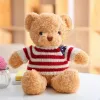 LEAN TOYS Plīša maskots mīkstais rotaļu lācītis svītrainā T-kreklā krēmkrāsā 32cm