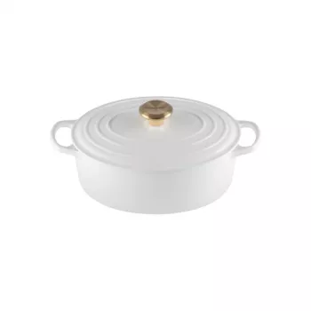LE CREUSET emaljēts čuguna ovāls holandiešu katls 27 cm 4,1 L balts