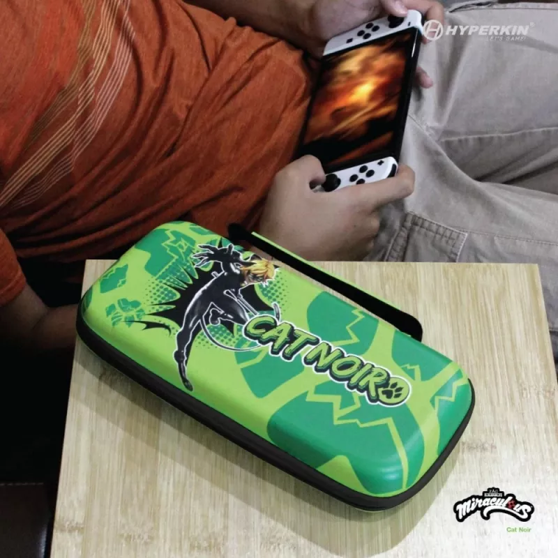 Hyperkin M07541-MTCN cietais maciņš, zaļš, daudzkrāsains, PEVA, Nintendo Switch Lite, triecienizturīgs, ūdensizturīgs, pārnēsāšanas soma