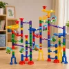 LEAN TOYS Konstruktora komplekts Bumbiņu trase Tuneļi Krāsaini dinozauri 192 gab.