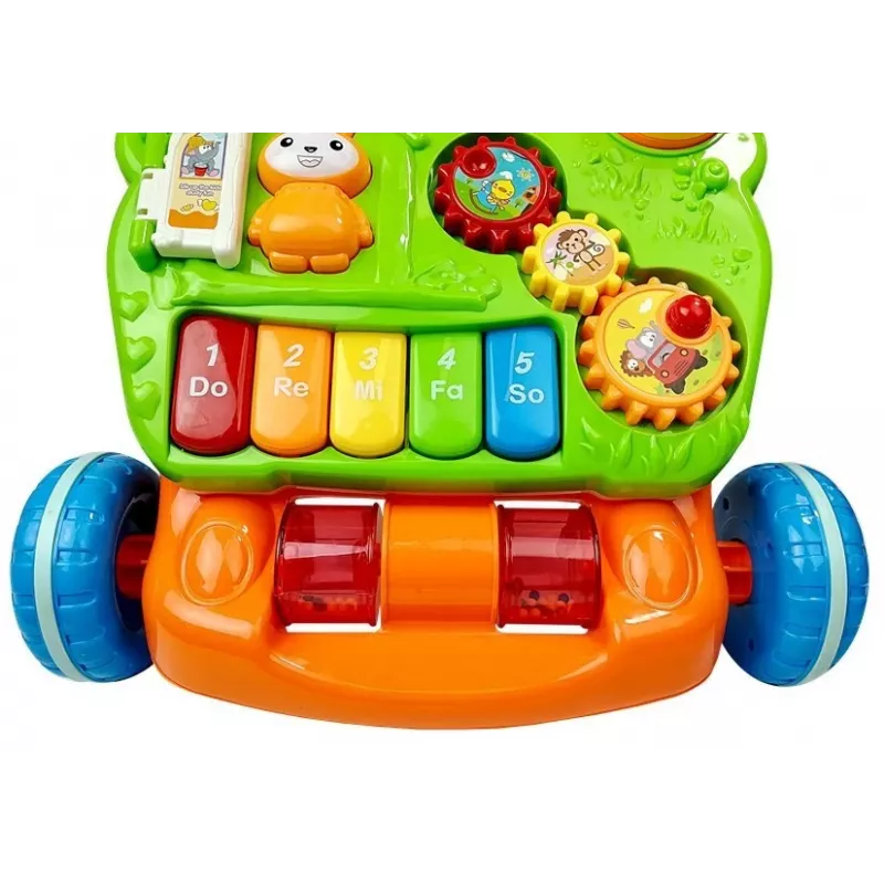 LEAN TOYS Izglītojošais stūmējs mazuļiem ar klavierēm