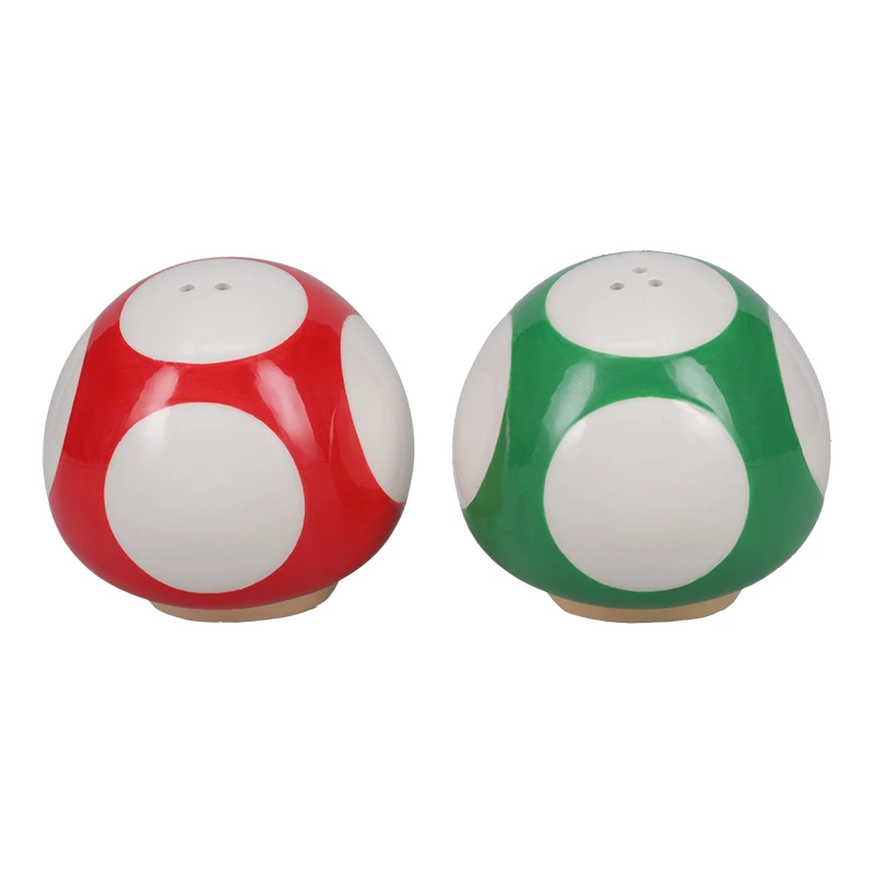 Paladone Super Mario sēņu sāls un piparu trauciņu komplekts (sarkanā super sēne un zaļā 1-Up sēne)