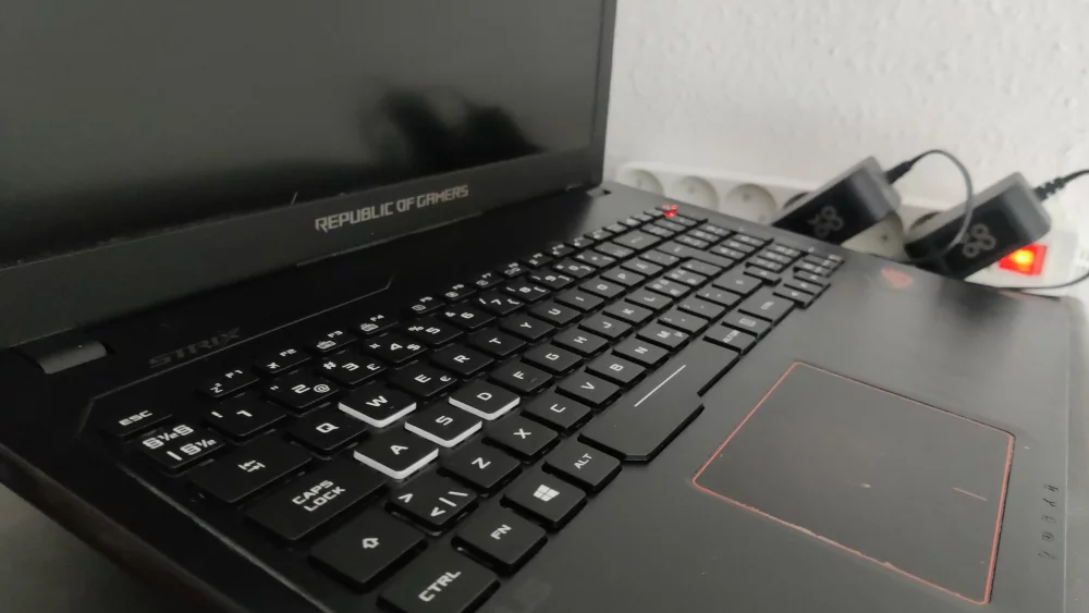 Gaming laptop keyboard with red backlight